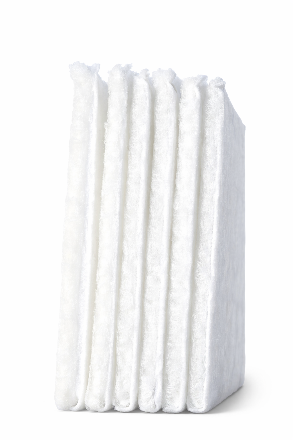 A stack of 6 premium FILTR handcrafted HVAC filters representing a full one-year supply.